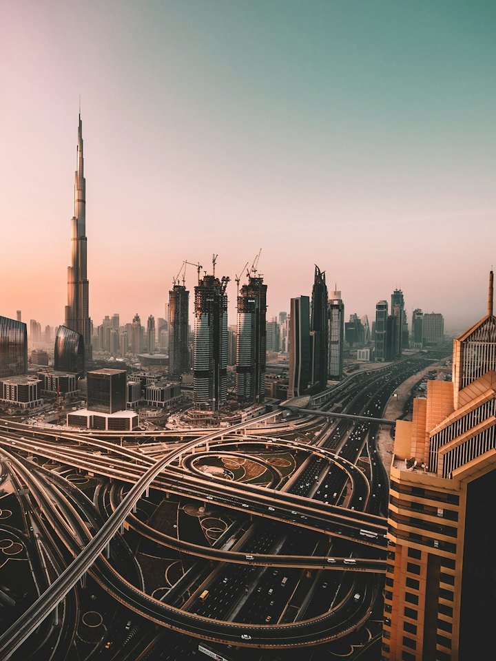 The Burj Khalifa above the Dubai skyline at dusk